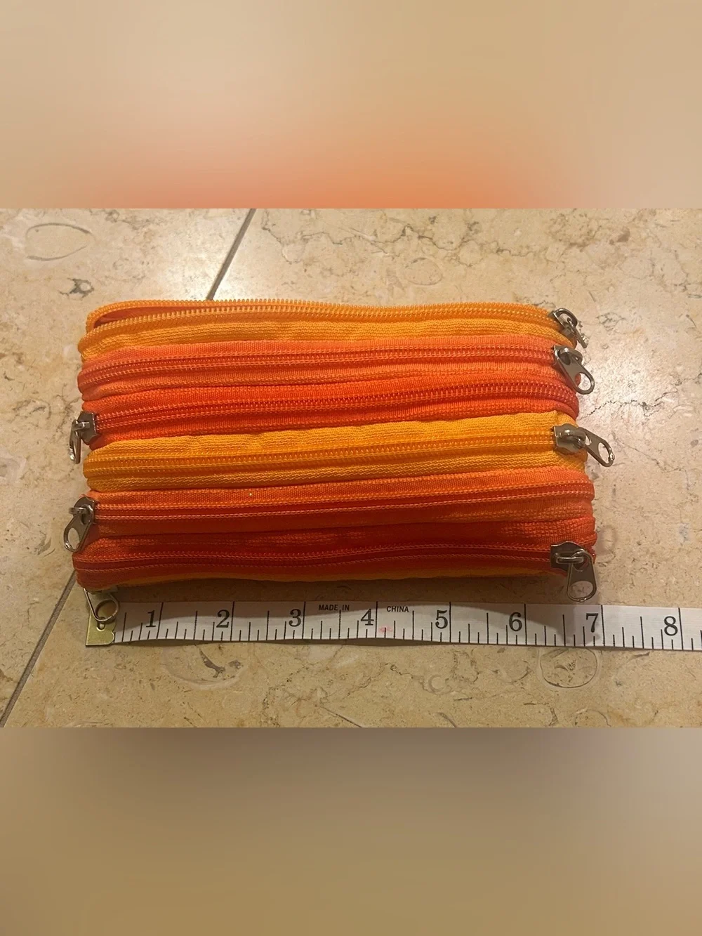 Striped Two Tone Orange 7 Zipper Pouch
